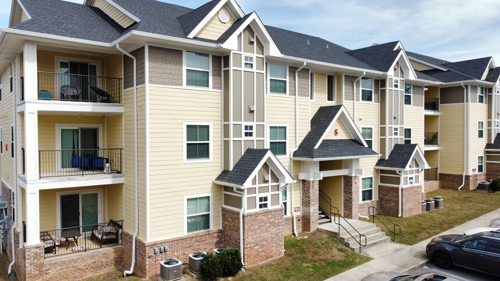 an exterior view of an apartment building with balconies